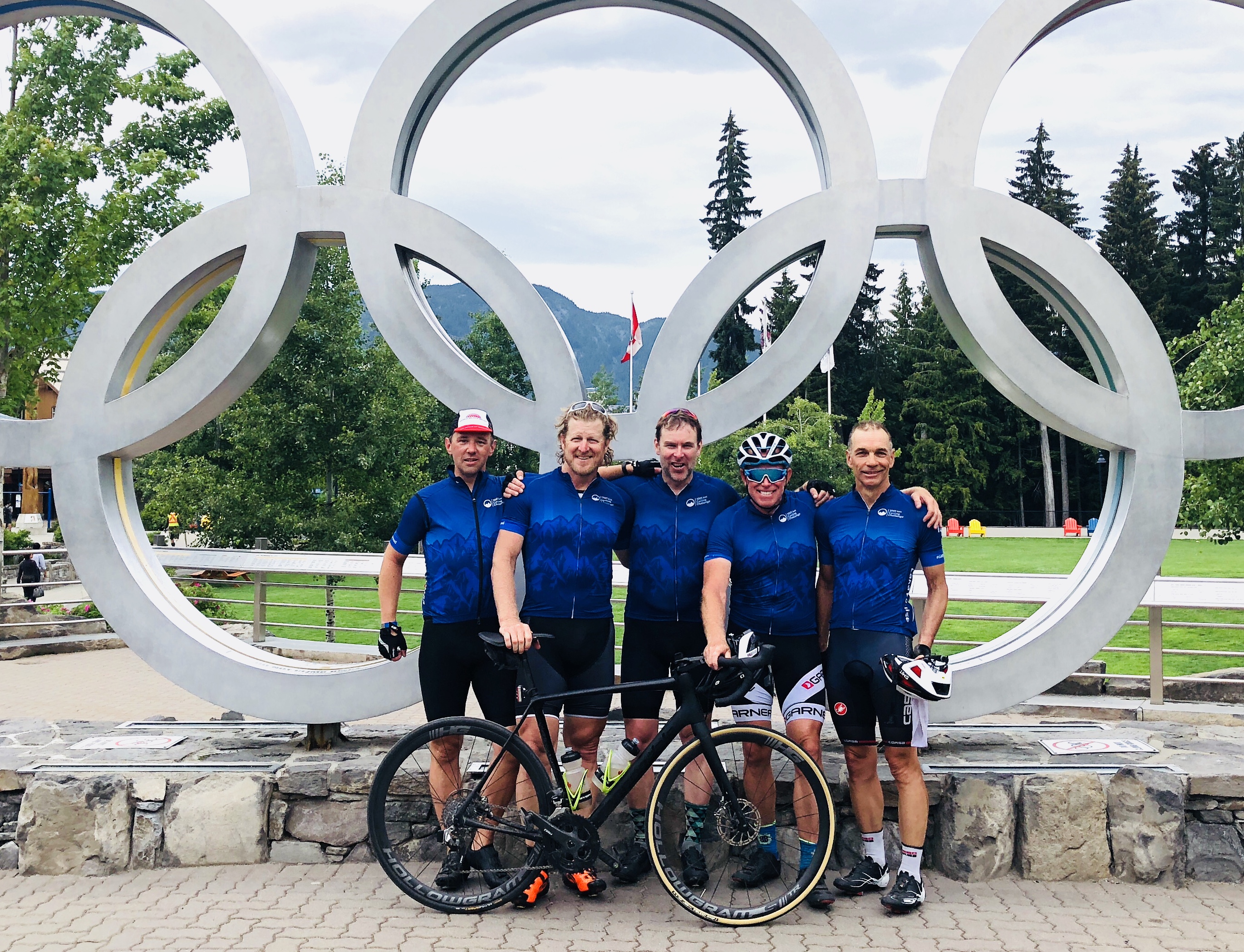 Greg together with other cyclists